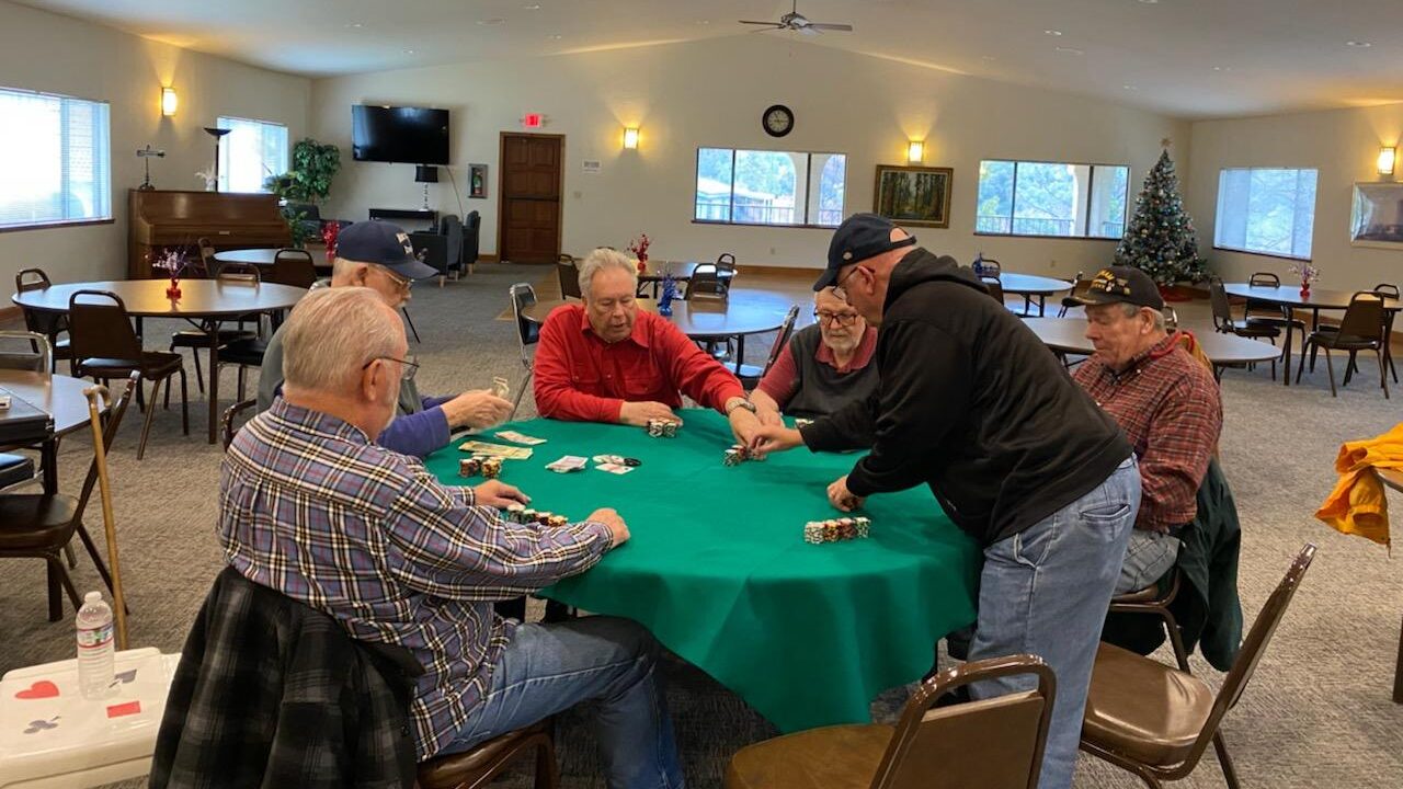 Residents playing Poker