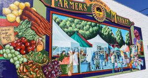 A mural depicting a farmers market.