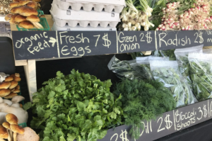 A display of fresh vegetables at a farmers' market in Tuolumne County.